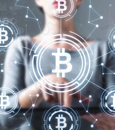 bitcoin-with-woman-using-tablet-1956935