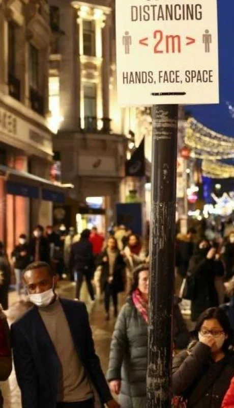 people-walk-along-regent-street-amid-the-coronavirus-disease-covid-19-outbreak-in-london