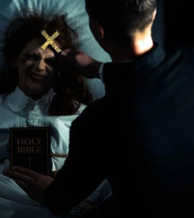 stock-photo-exorcist-bible-cross-standing-demonic-jpg.