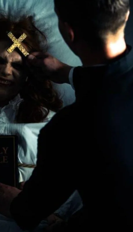 stock-photo-exorcist-bible-cross-standing-demonic-jpg.