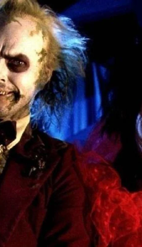 Michael-Keaton-and-Winona-Ryder-in-Beetlejuice-Wedding