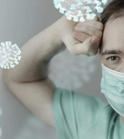 Persona con barbijo que se protege de virus