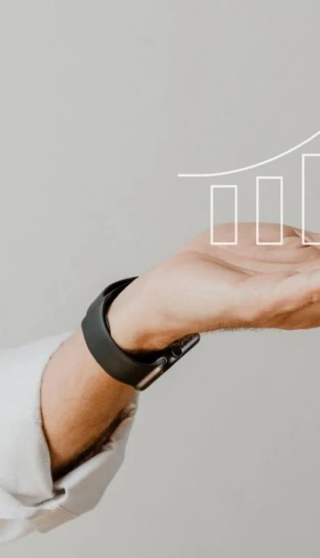 digital-increasing-bar-graph-with-businessman-hand-overlay-jpg.