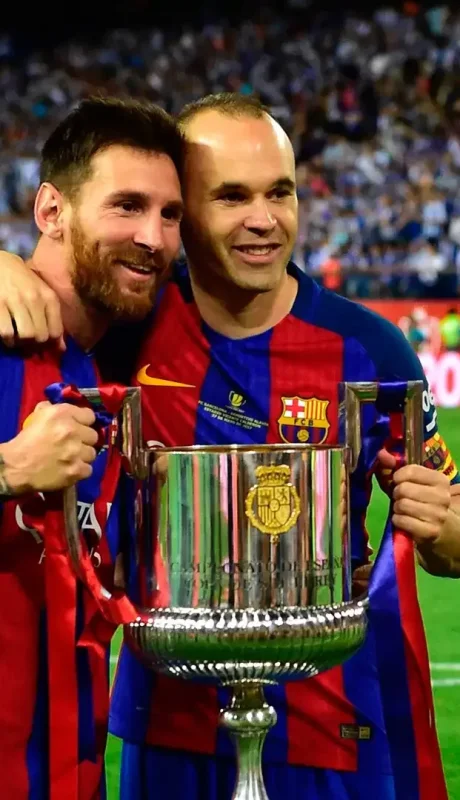 Leo Messi y Andrés Iniesta.