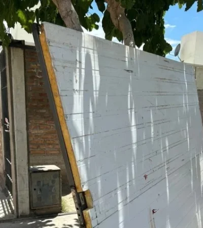 El portó que cayó arriba de una nena.