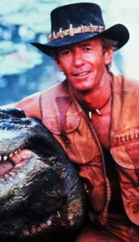 Burt, posando junto a Paul Hogan en Cocodrilo Dundee.