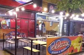 VIDEO: así un ladrón armado se llevó dinero y un celular de una pizzería