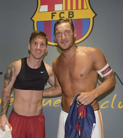 Totti y Messi.