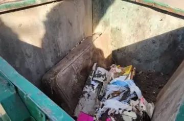 Macabro hallazgo dentro de una valija en un contenedor de basura