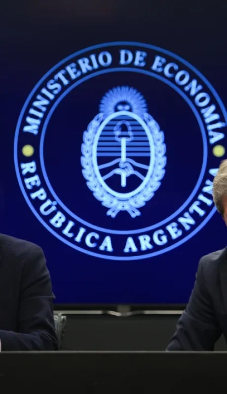 Santiago Bausili y Luis Caputo.