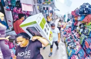 ¡Chau billetes y comisiones! Así pagan las familias en sus viajes de compras