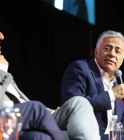 Cornejo junto a Poggi en el encuentro