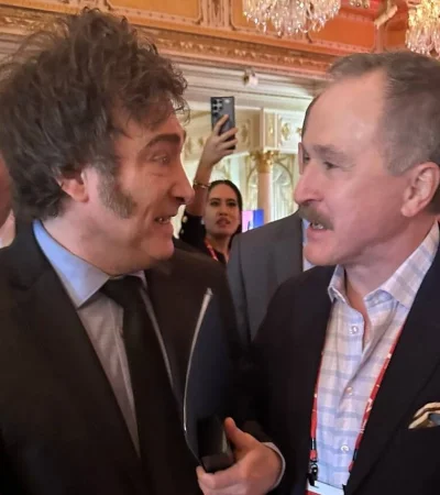 Milei junto a Peter Lamelas.