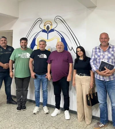 Omar Sperdutti junto a los representantes de las prestadoras médicas