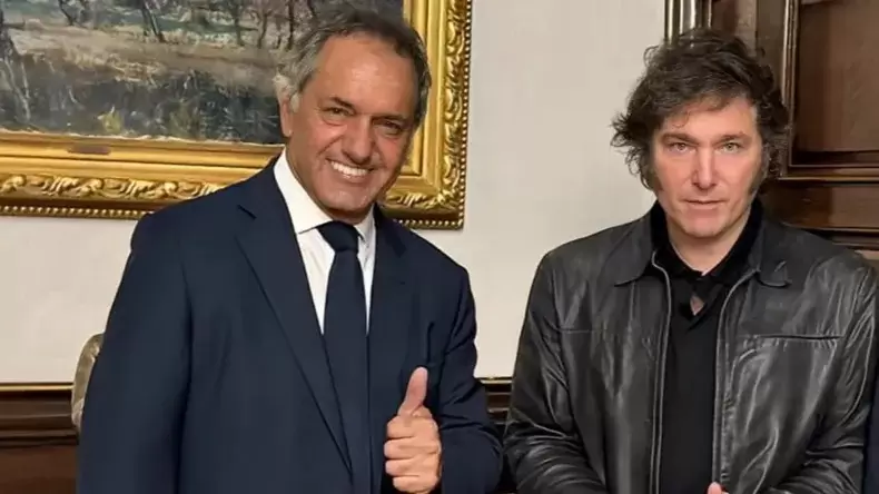 Daniel Scioli con Javier Milei